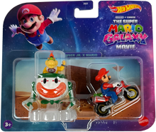 Hot Wheels The Super Mario Galaxy Movie toy set in its original blister packaging, featuring a small Mario on a motorcycle and a Bowser Jr. X Mario figure.