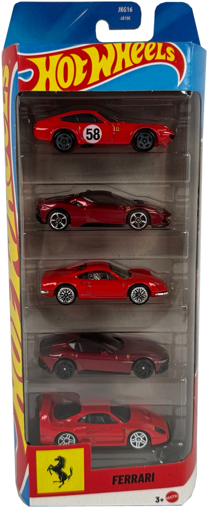 A Hot Wheels toy car set in retail packaging, featuring five miniature Ferrari sports cars in red and dark metallic shades, displayed in a clear plastic blister pack with a blue and red Hot Wheels header card.