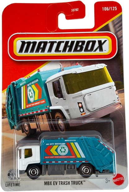 Matchbox MBX EV Trash Truck toy in its original blister card packaging, featuring a teal and white garbage truck with colorful graphics.