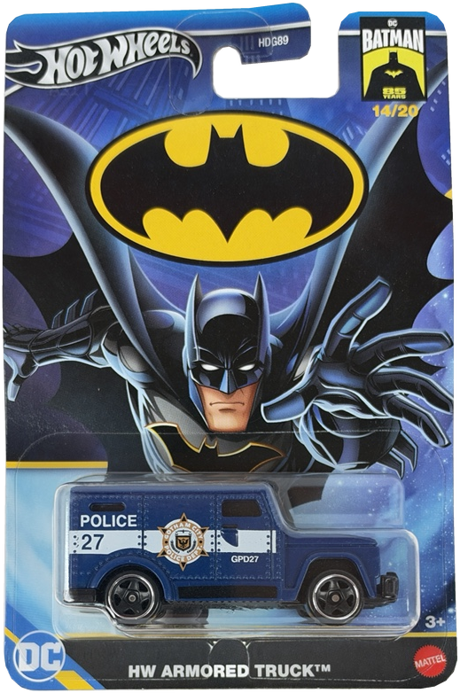 Hot Wheels Batman HW Armored Truck toy in its original blister card packaging, featuring a blue police truck with Batman graphics on the card.