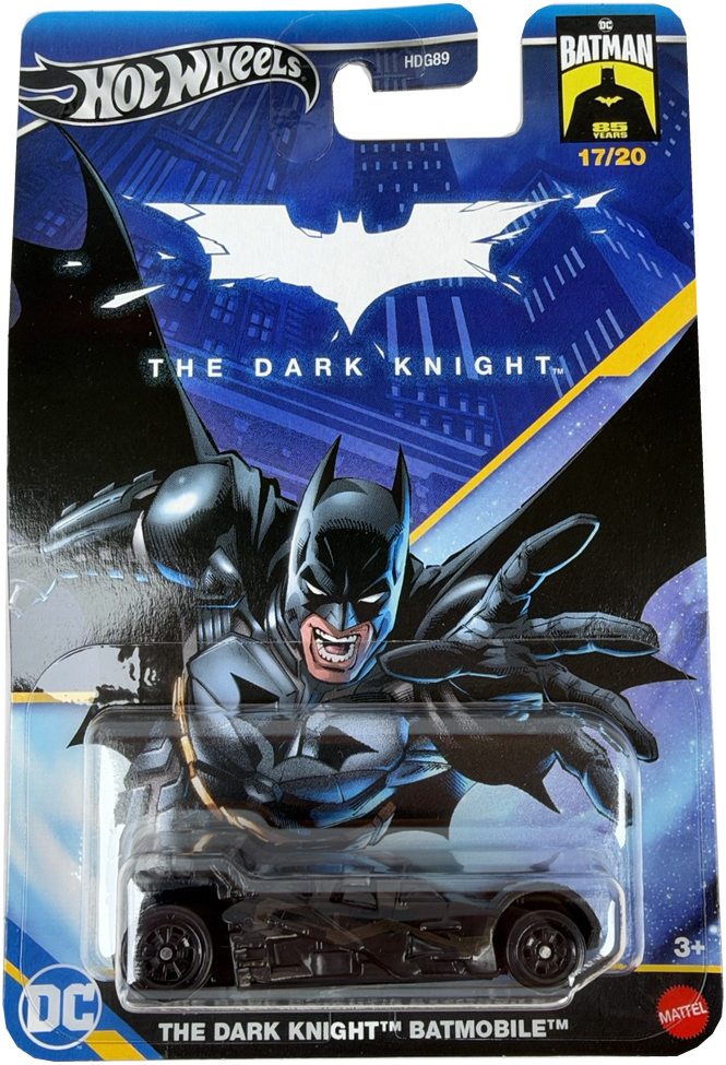 Hot Wheels Batman The Dark Knight Batmobile carded packaging, featuring a small black and blue toy car in a clear blister pack with Batman artwork on the card.