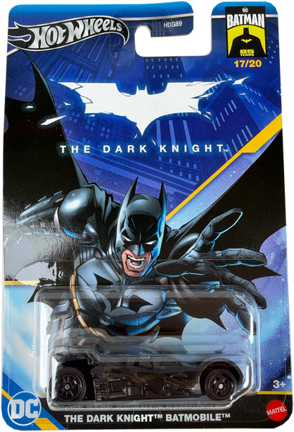 Hot Wheels Batman The Dark Knight Batmobile carded packaging, featuring a small black and blue toy car in a clear blister pack with Batman artwork on the card.