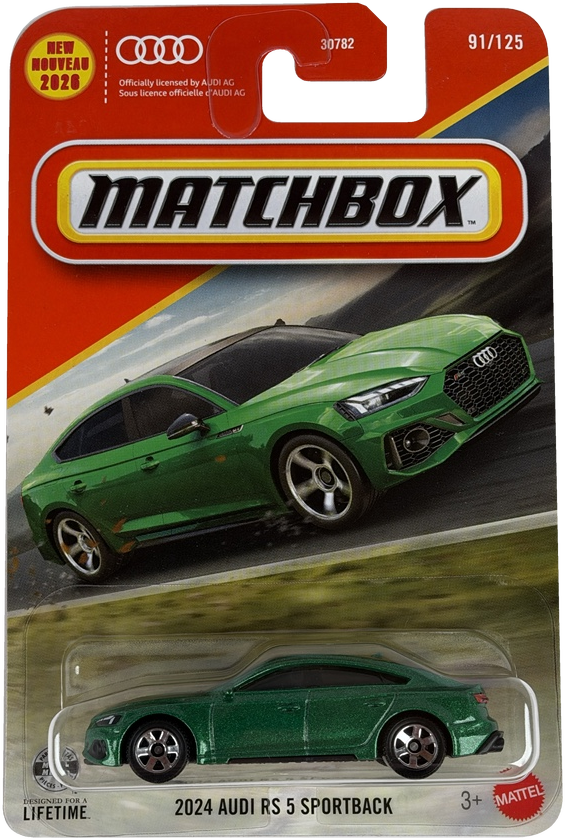 Matchbox 2024 Audi RS 5 Sportback diecast toy car in its original blister packaging. The packaging features a orange and yellow header card with the Matchbox logo, an illustration of the green car on a racetrack, and a small green car visible inside the clear blister.