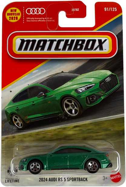 Matchbox 2024 Audi RS 5 Sportback diecast toy car in its original blister packaging. The packaging features a orange and yellow header card with the Matchbox logo, an illustration of the green car on a racetrack, and a small green car visible inside the clear blister.
