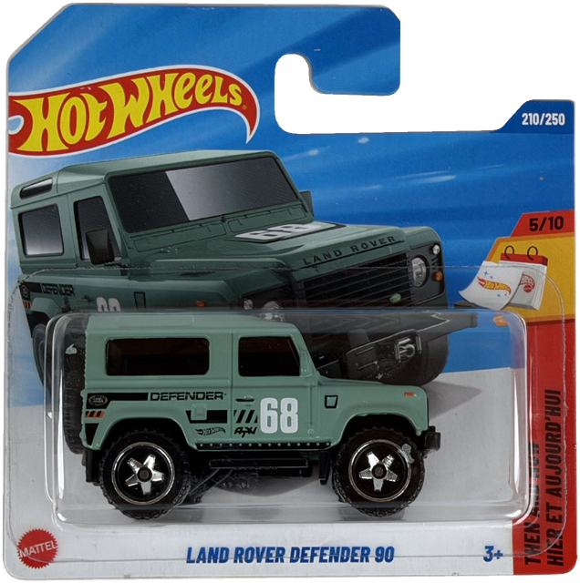 Hot Wheels Land Rover Defender 90 toy car in its original blister card packaging, featuring a mint green diecast model with black wheels and white racing-style decals.