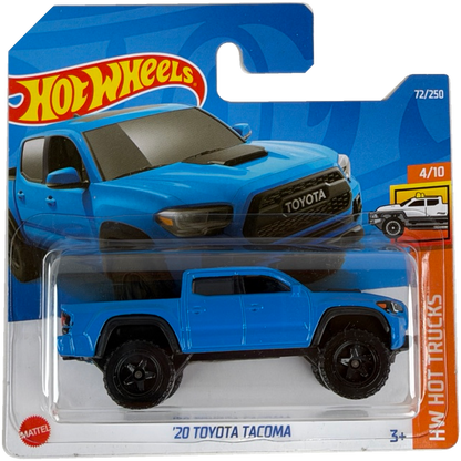 Hot Wheels die-cast toy truck of a 2020 Toyota Tacoma in blue, packaged on its original card. The packaging features the Hot Wheels logo and a picture of the real truck.