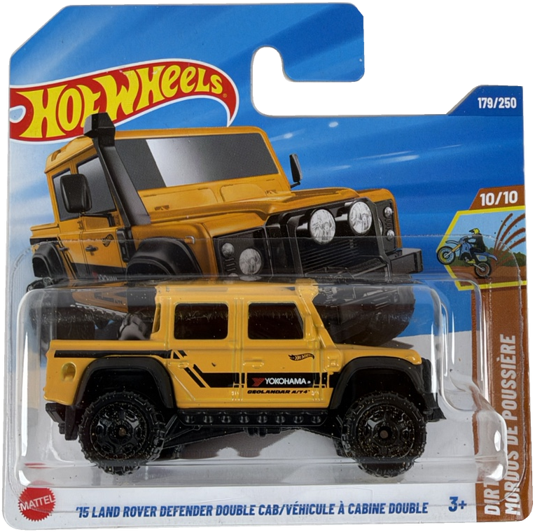 Hot Wheels die-cast toy vehicle package featuring a yellow and black '15 Land Rover Defender Double Cab. Diecast truck is displayed in front of a printed illustration of the same vehicle on a blue and white blister card with Hot Wheels branding.